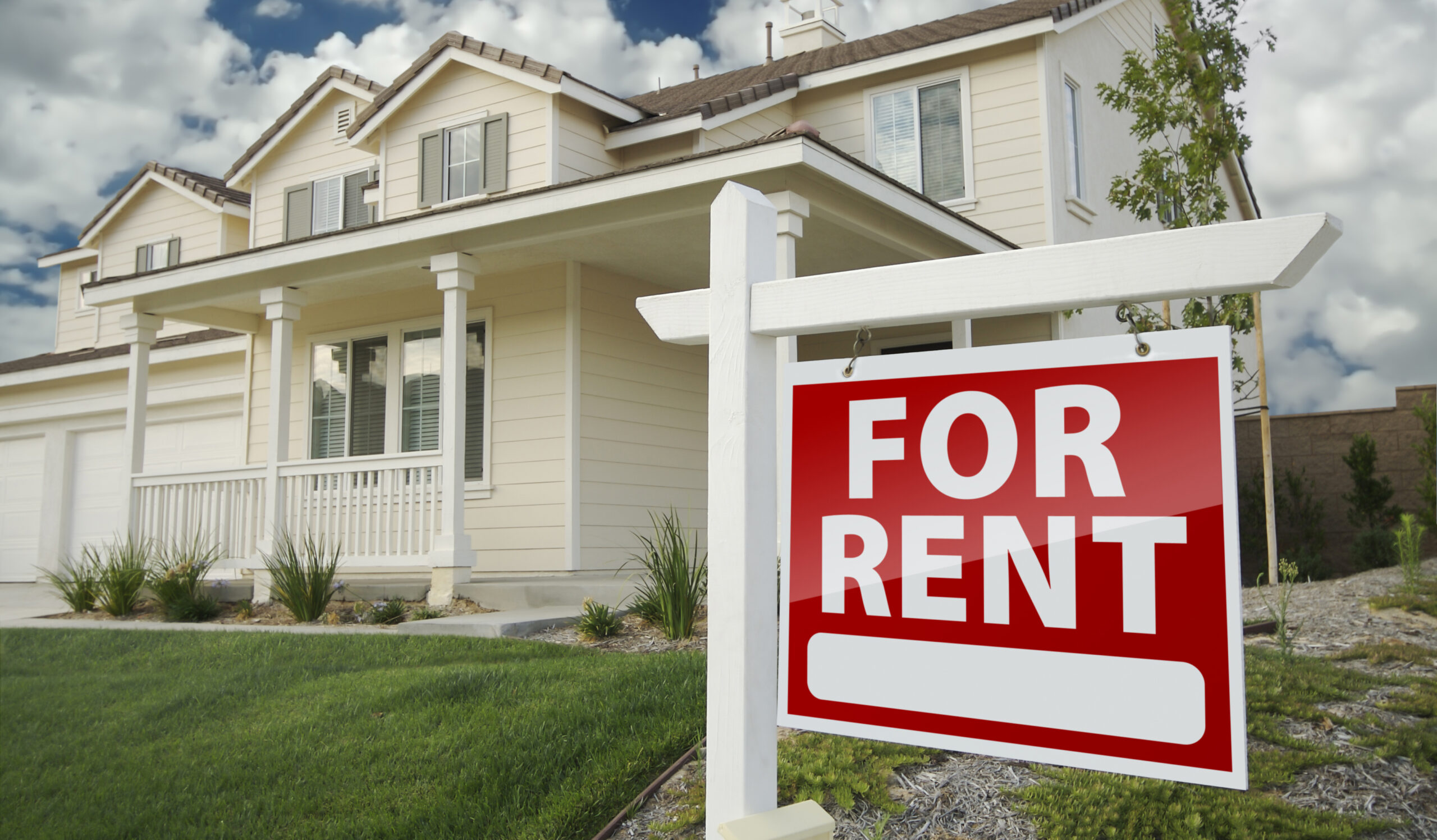 Left Facing Red For Rent Real Estate Sign in Front of Beautiful House.; Shutterstock ID 73089739